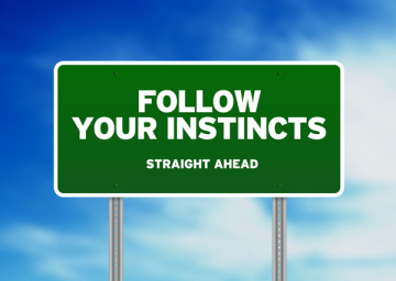 Green Road Sign - Follow Your Instincts